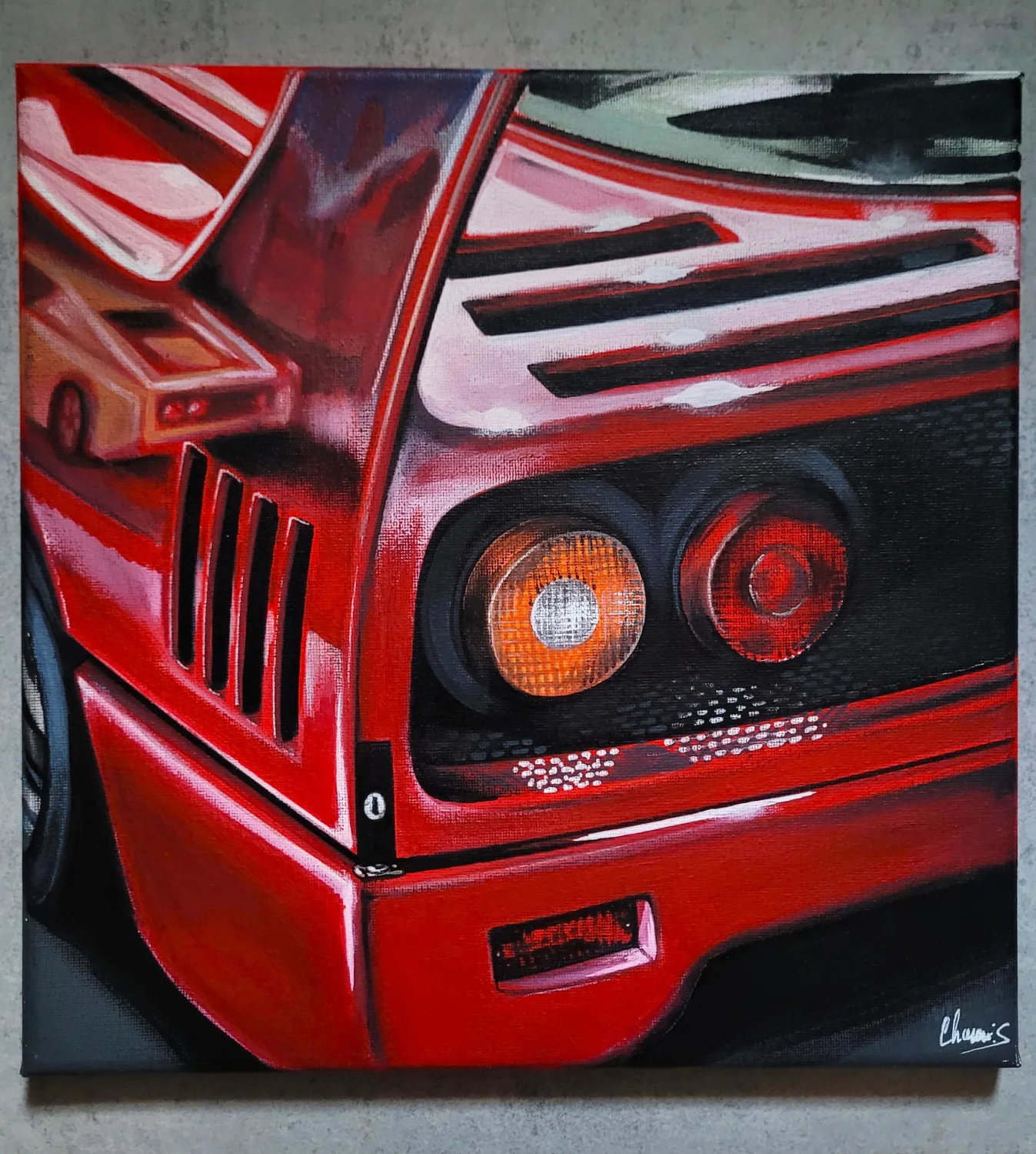 Peinture acrylique en gros plan des feux arrière d'une Ferrari F40 rouge